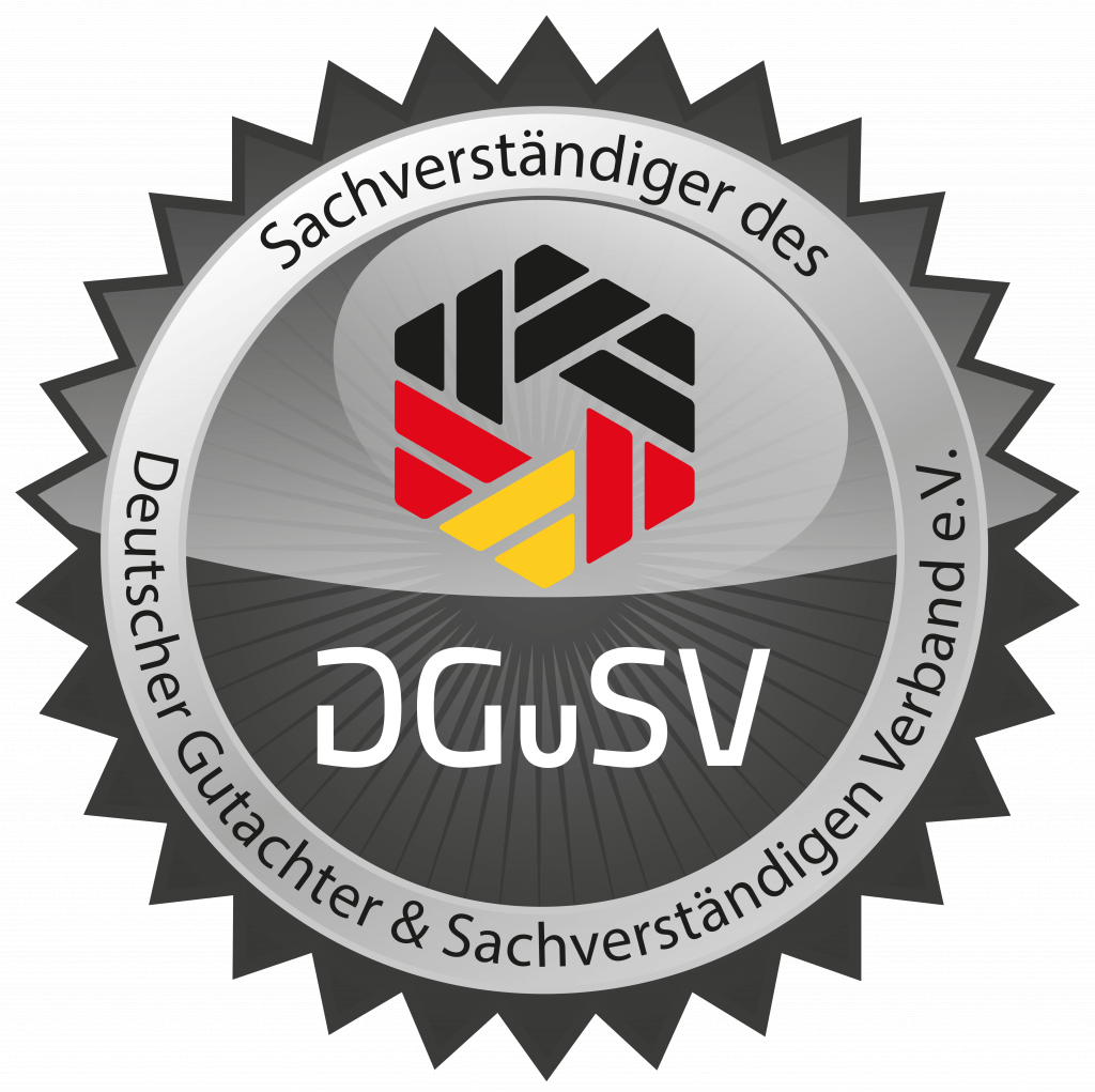 Rundes DGSV-Logo mit schwarz-rot-gelbem Design, silbernem Rand und deutscher Zertifizierungsschrift am Rand